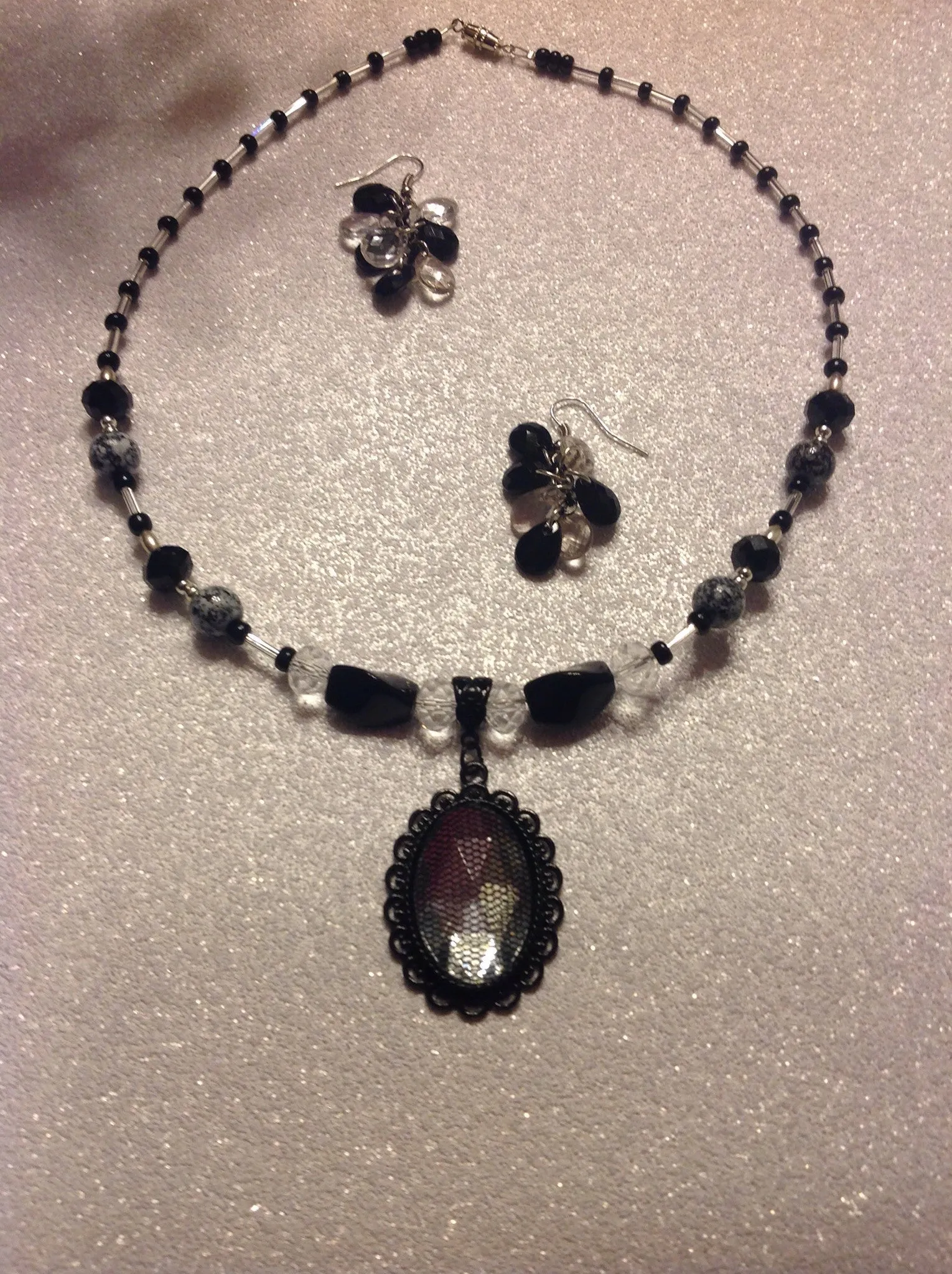 Black and crystal pendant beaded necklace