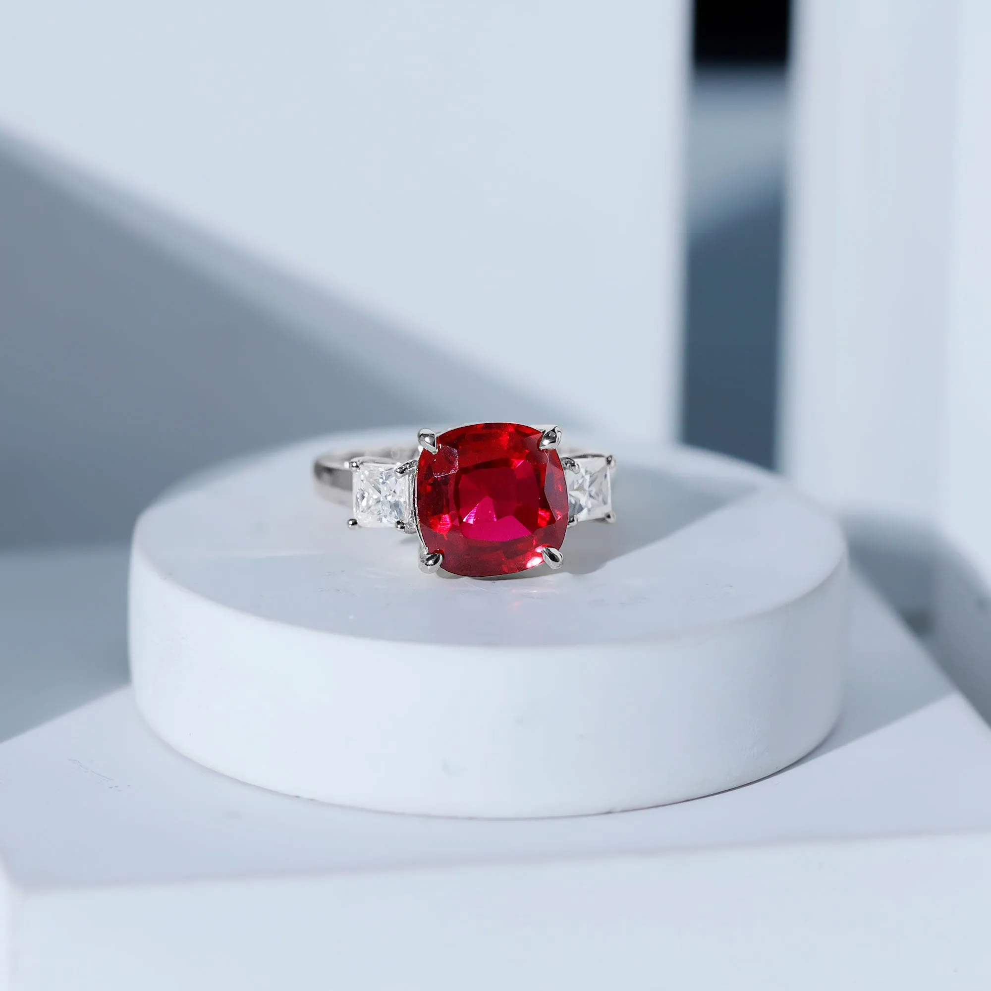 Cushion Created Ruby Solitaire Engagement Ring with Princess Cut Moissanite