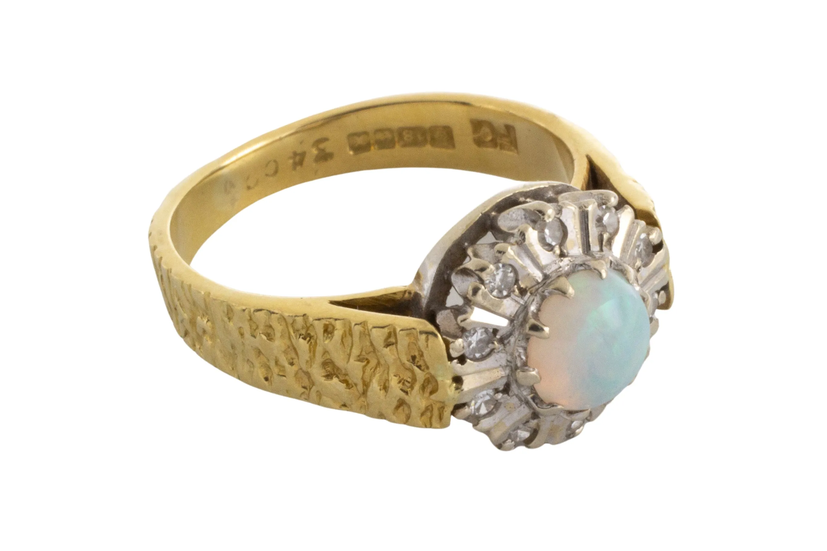 Opal and diamond ring in 18 carat gold