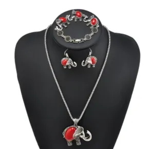 Silvertone elephant set with necklace, bracelet, and earrings